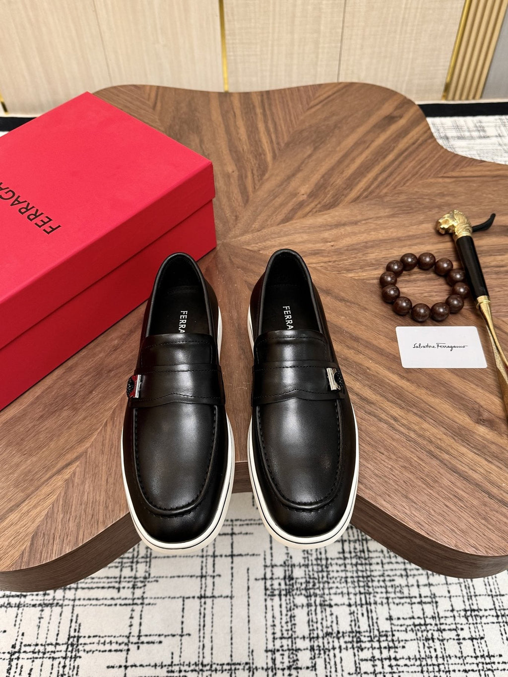 Salvatore Ferragamo Black Loafers with White Soles — front