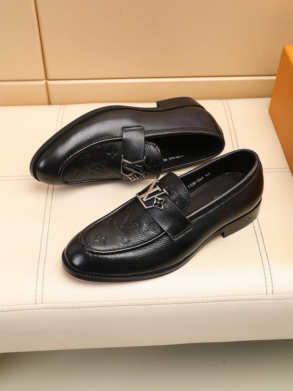 Louis Vuitton Black Embossed Loafers — front
