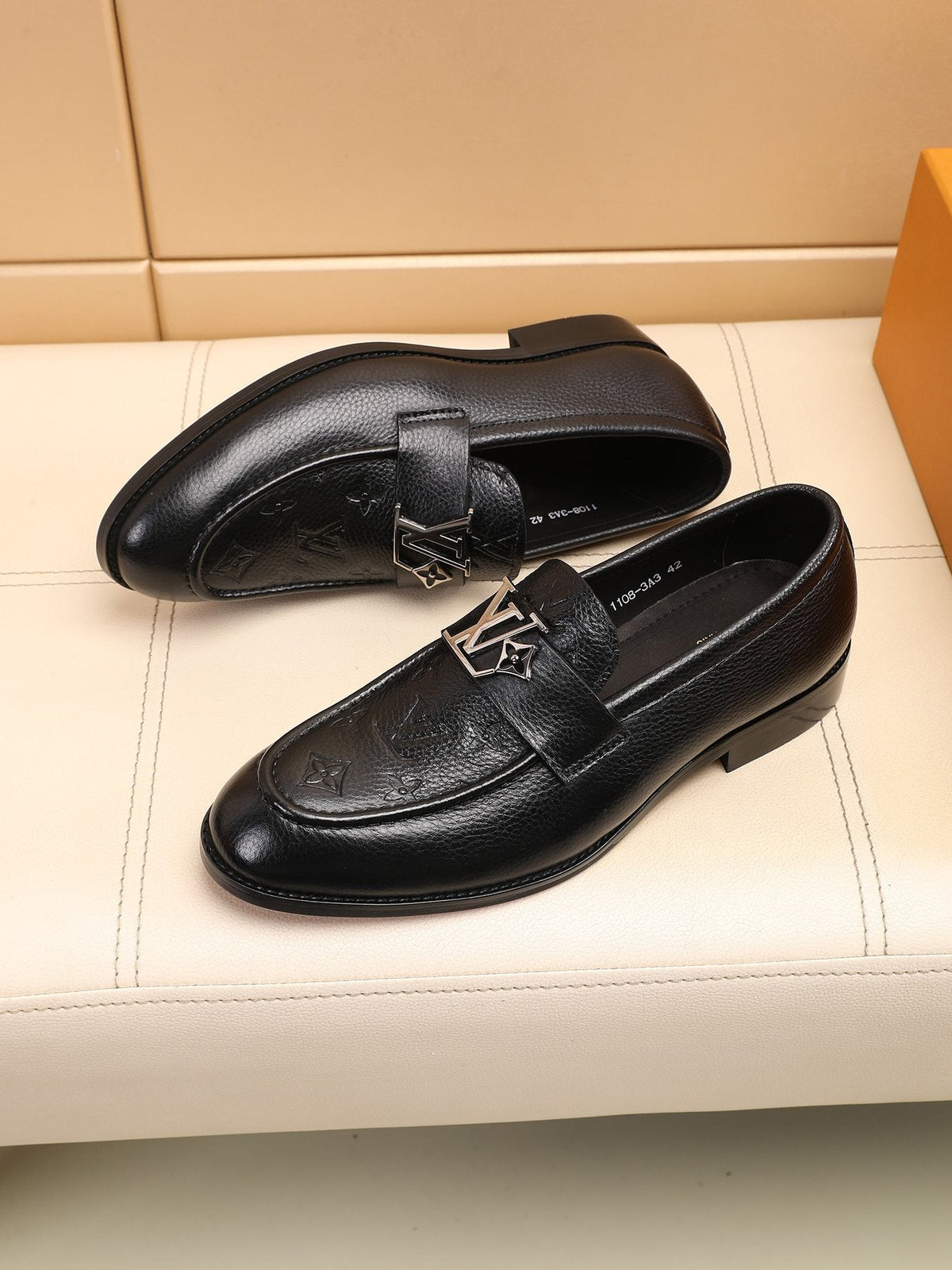 Louis Vuitton Black Embossed Loafers — front