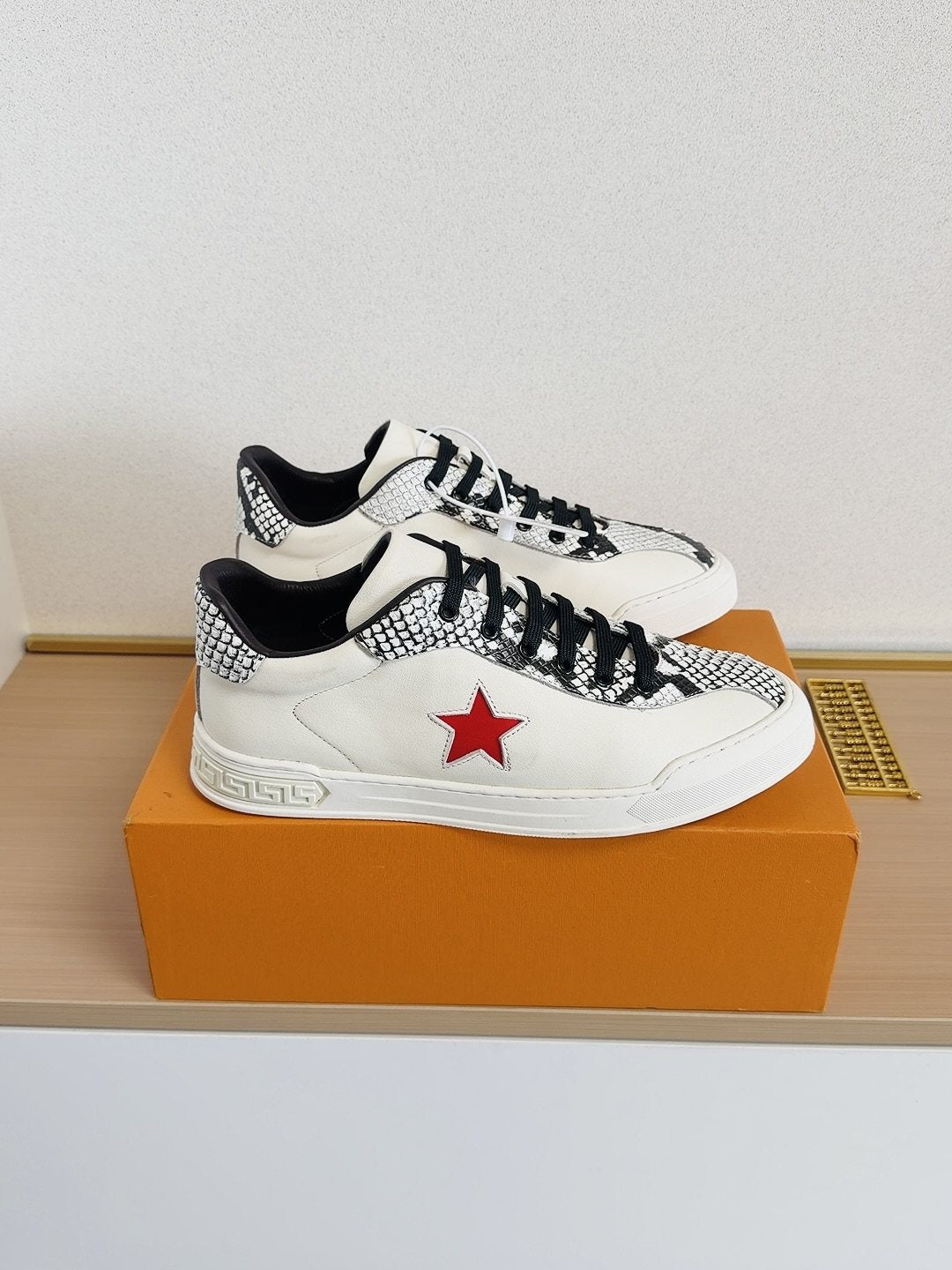 Louis Vuitton Red Star Low-Top Sneakers — front