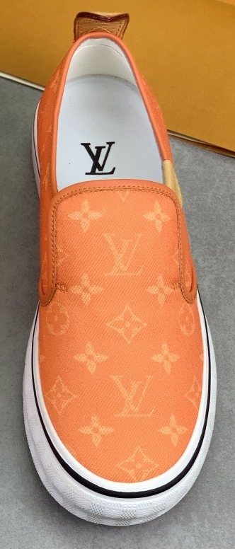Louis Vuitton Orange Patterned Slip-On Shoes — front