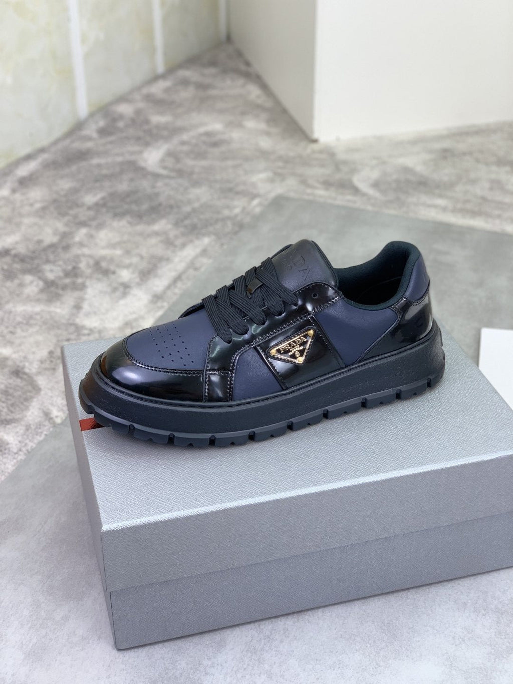 Prada Paneled Lug-Sole Low-Top Sneakers — hero
