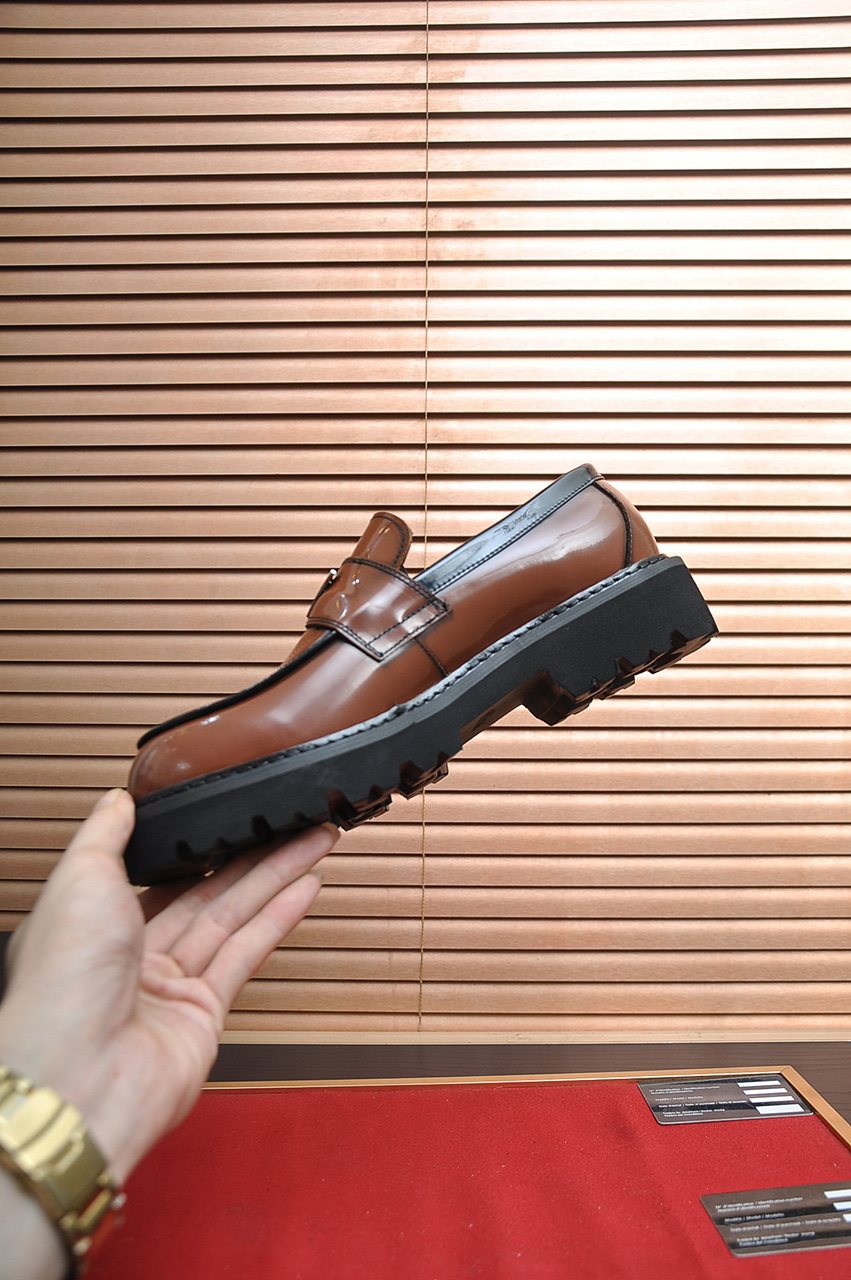 Prada Lug-Sole Strap Loafers — model