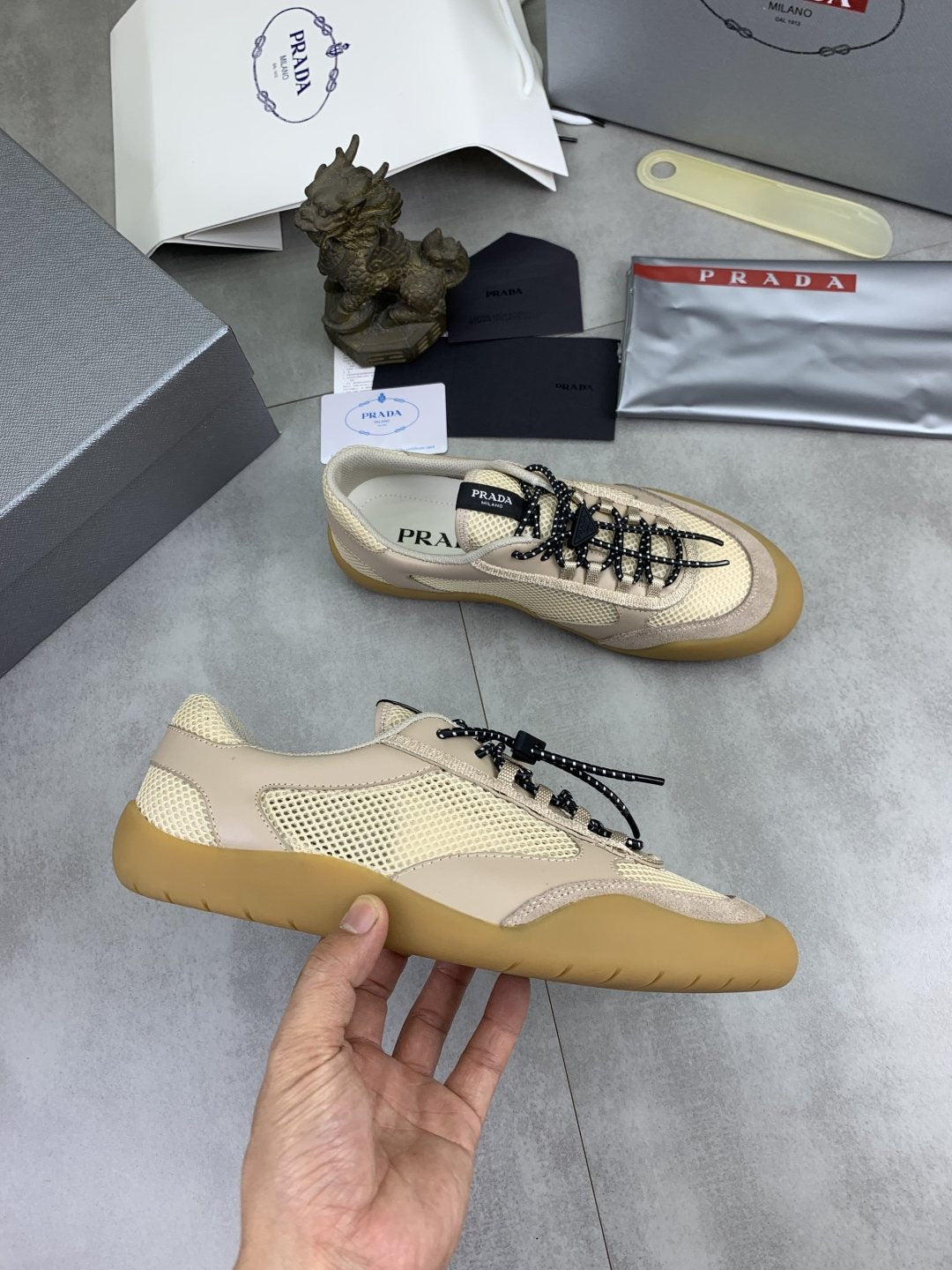 Prada Paneled Low-Top Sneakers — model