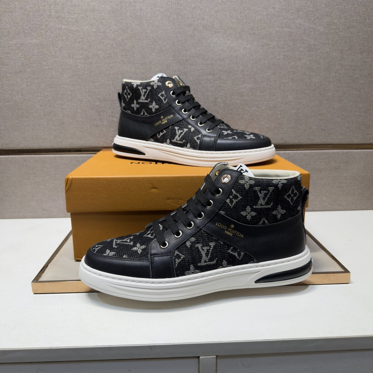 Louis Vuitton Patterned High-Top Sneakers — model