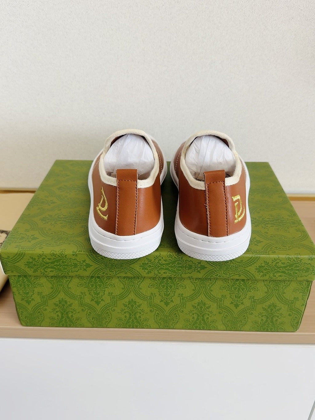 Gucci Brown Slip-On Sneakers with White Toe Caps — back