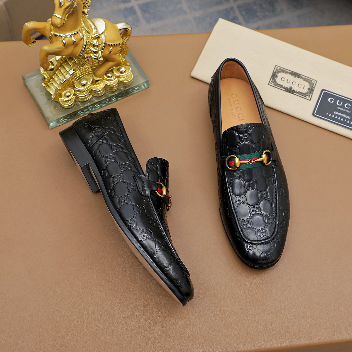 Gucci Patterned Metal-Bit Loafers — front