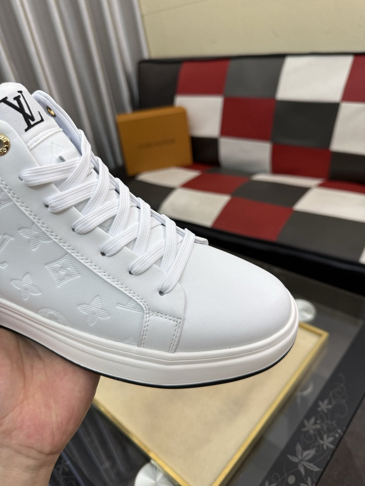 Louis Vuitton Embossed High-Top Sneakers — detail