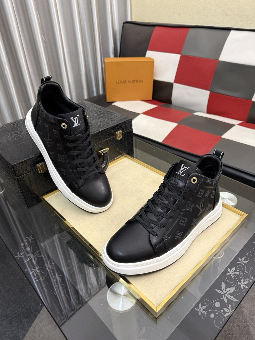 Louis Vuitton Embossed High-Top Sneakers — front