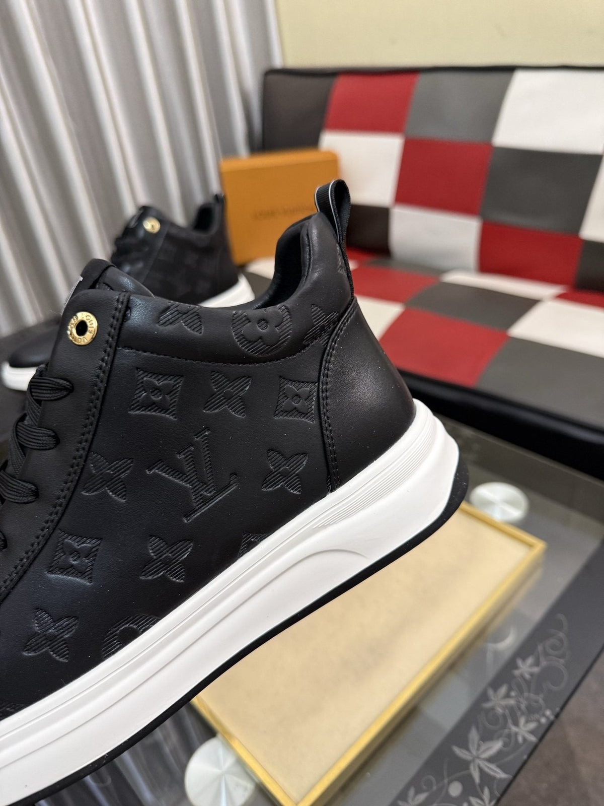 Louis Vuitton Embossed High-Top Sneakers — detail