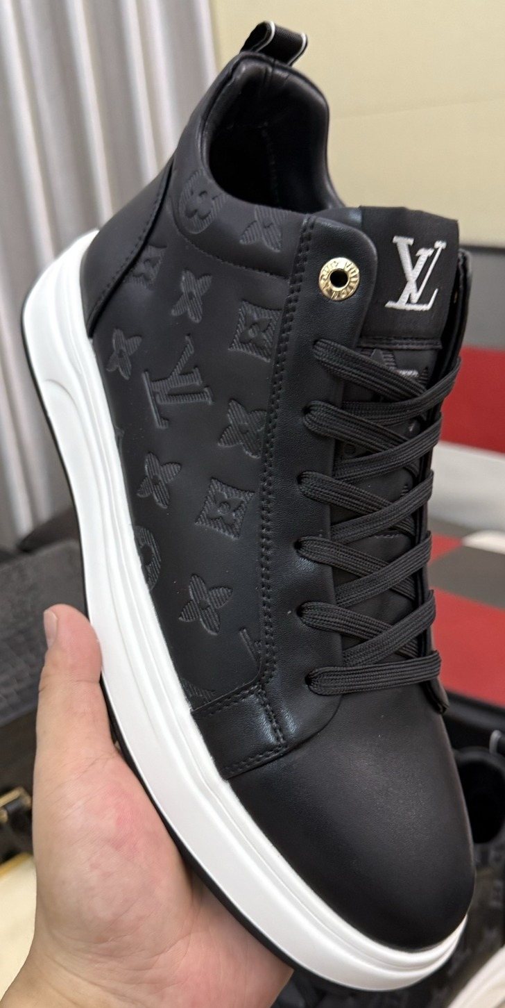 Louis Vuitton Embossed High-Top Sneakers — hero
