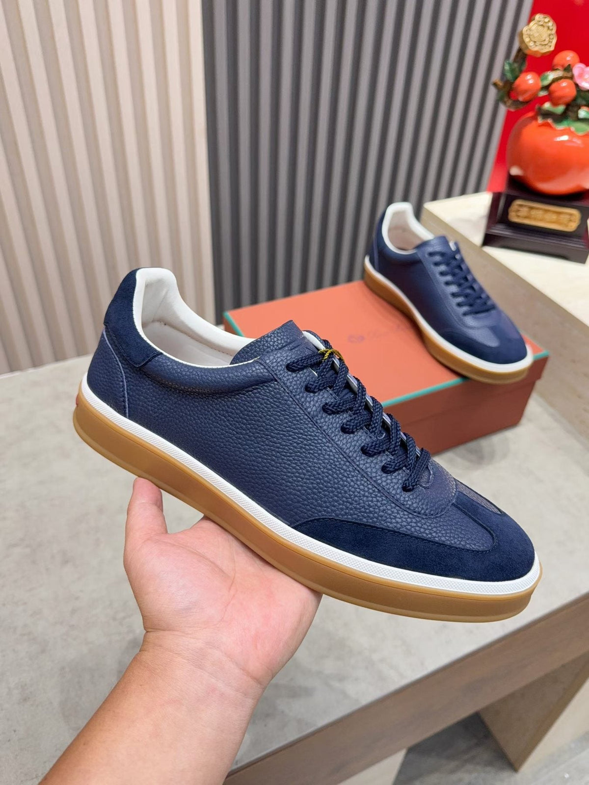 Paneled Low-Top Lace-Up Sneakers — model